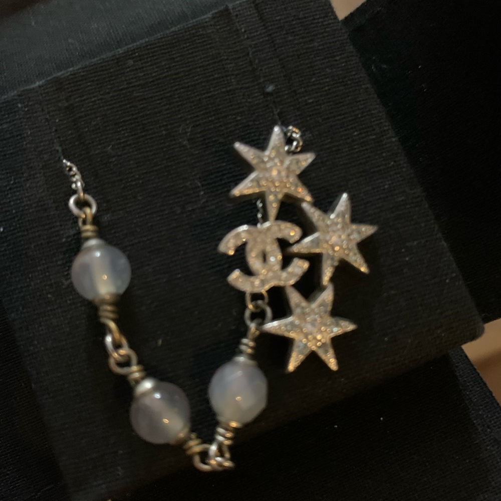 Chanel star necklace.